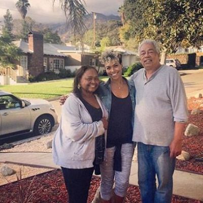 Gillian Iliana Waters posing for a photo shoot along with her father,  Victor Waters, and mother, Cheryl Waters
